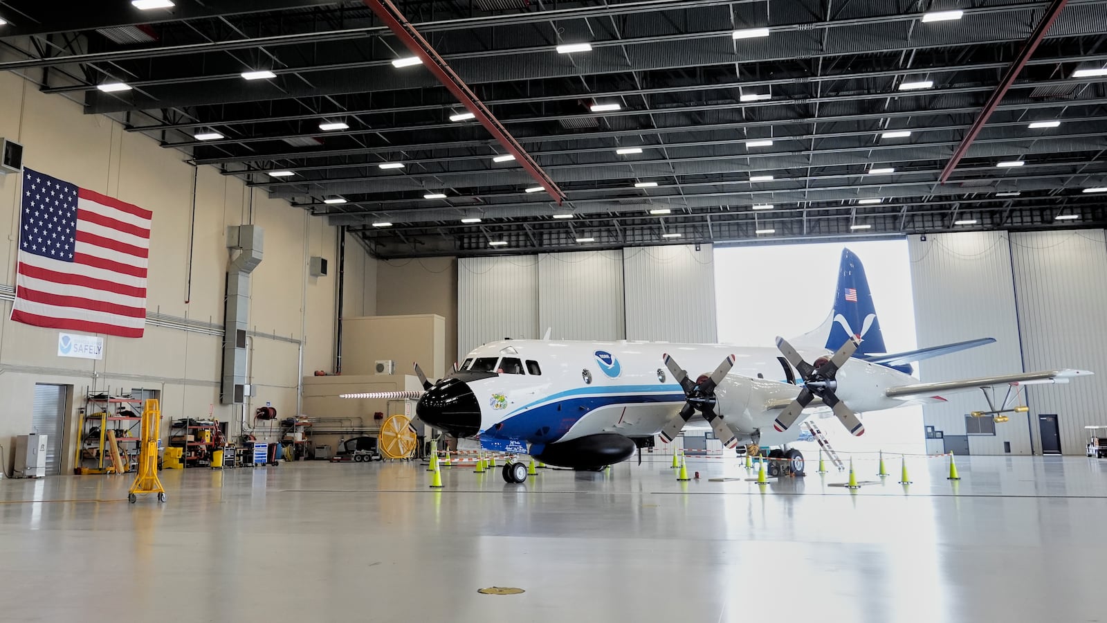 The Lockheed WP-3D Orion "Hurricane Hunter" aircraft is seen in a hangar at the NOAA Aircraft Operations Center Tuesday, May 6, 2025, in Lakeland, Fla. (AP Photo/John Raoux)