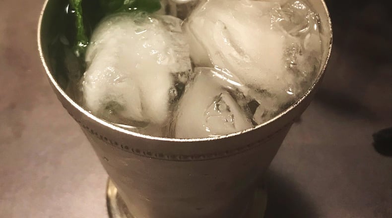The signature drink of The Kentucky Derby is the Mint Julep. The Mint Julep is an extremely strong bourbon drink, with minimal ingredients. CONTRIBUTED PHOTO / TESS VELLA-COLLETTE