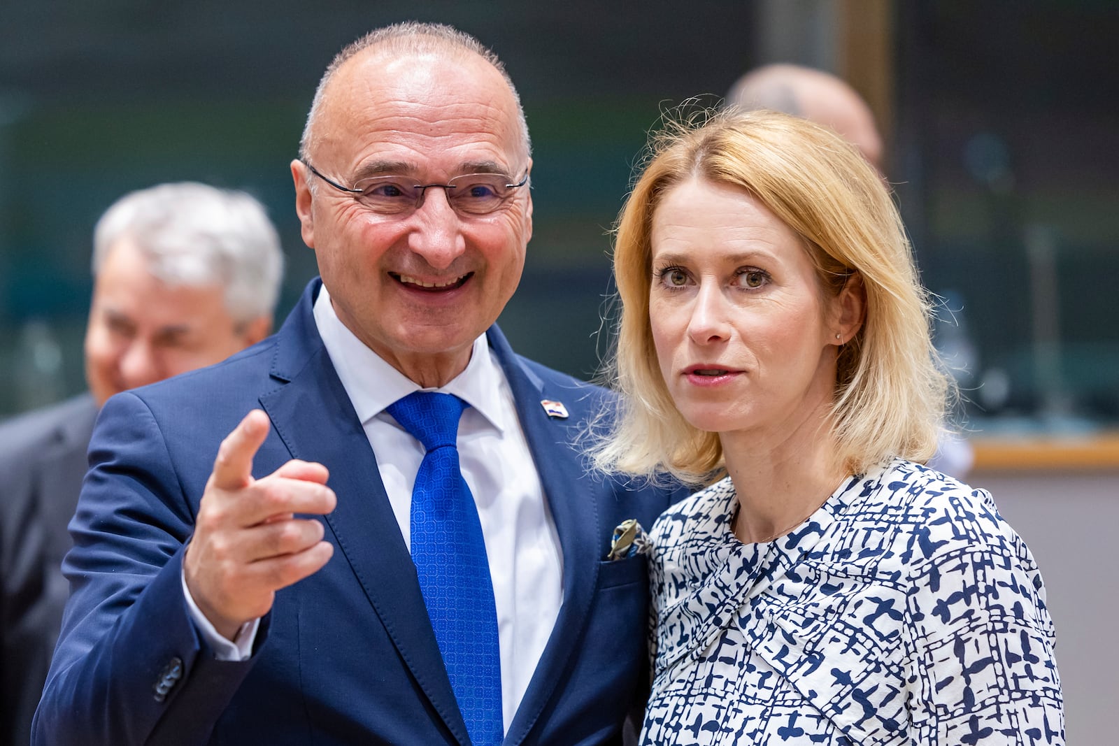 Croatia's Foreign Minister Gordan Grlic Radman, left, talks with European Union foreign policy chief Kaja Kallas during the EU foreign ministers meeting at the EU Council building in Brussels, Tuesday, July 15, 2025. (AP Photo/Geert Vanden Wijngaert)