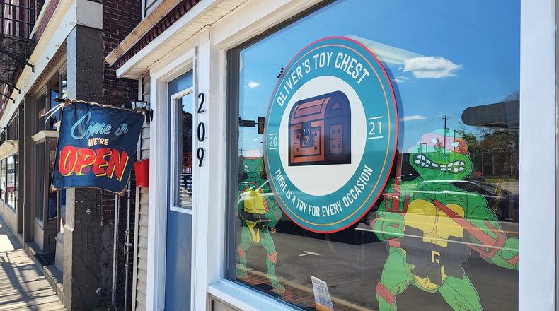 Samantha Schmidt and David Robbins have opened a brick-and-mortar toy store in honor of their son, Oliver, 10, who died in October from complications of a bone marrow transplant. He had a form of leukemia and his parents promised they'd open a toy store when he got better. Instead, the store was opened in his memory. The store is opening Tuesday, May 3 on what would have been his 11th birthday. NICK GRAHAM/STAFF