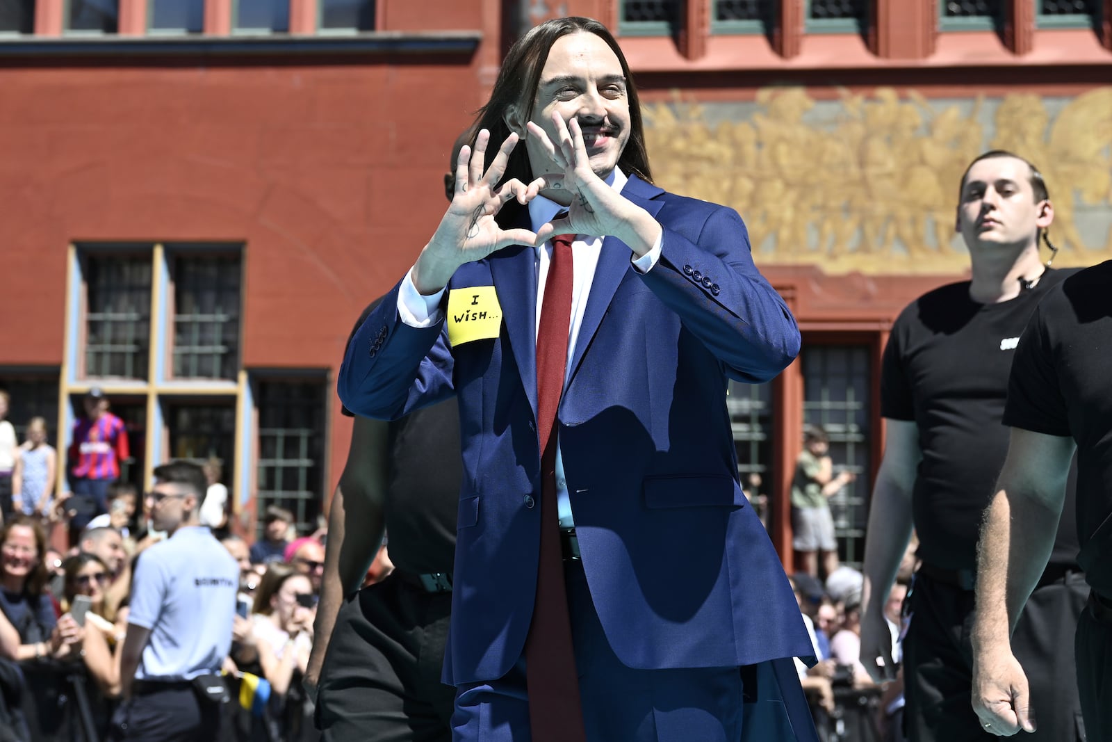 Estonia's Tommy Cash poses for a photo, during the opening ceremony of the 69th Eurovision Song Contest, in Basel, Switzerland, Sunday, May 11, 2025. (Peter Schneider/Keystone via AP)