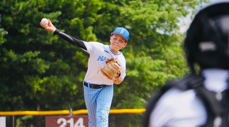 West Side Little League's Cash Jones sends a pitch to the plate. West Side beat Boardman 13-4 on Sunday to advance in the Ohio Little League state tournament at Boardman's Field of Dreams. CHRIS VOGT / CONTRIBUTED