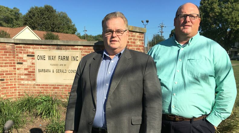 Madison Twp.’s Calvary Tabernacle Church pastor, the Rev. John Rice, and communications director Craig Inman stand before the One Way Farm marquee on Thursday, Sept. 5, 2019. Rice and his team will re-open the children’s home in Fairfield and Fairfield Twp. in about two weeks under the same name. MICHAEL D. PITMAN/STAFF