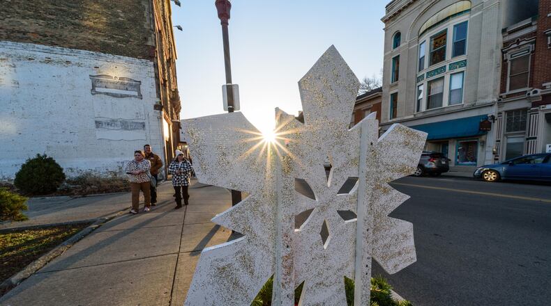 Middletown is seeing growth, its city leaders touted during a State of the City address this past week. Seen here are folks who were walking on Main Street during the South Main Candlelight Tour of Homes last weekend. TOM GILLIAM / CONTRIBUTING PHOTOGRAPHER