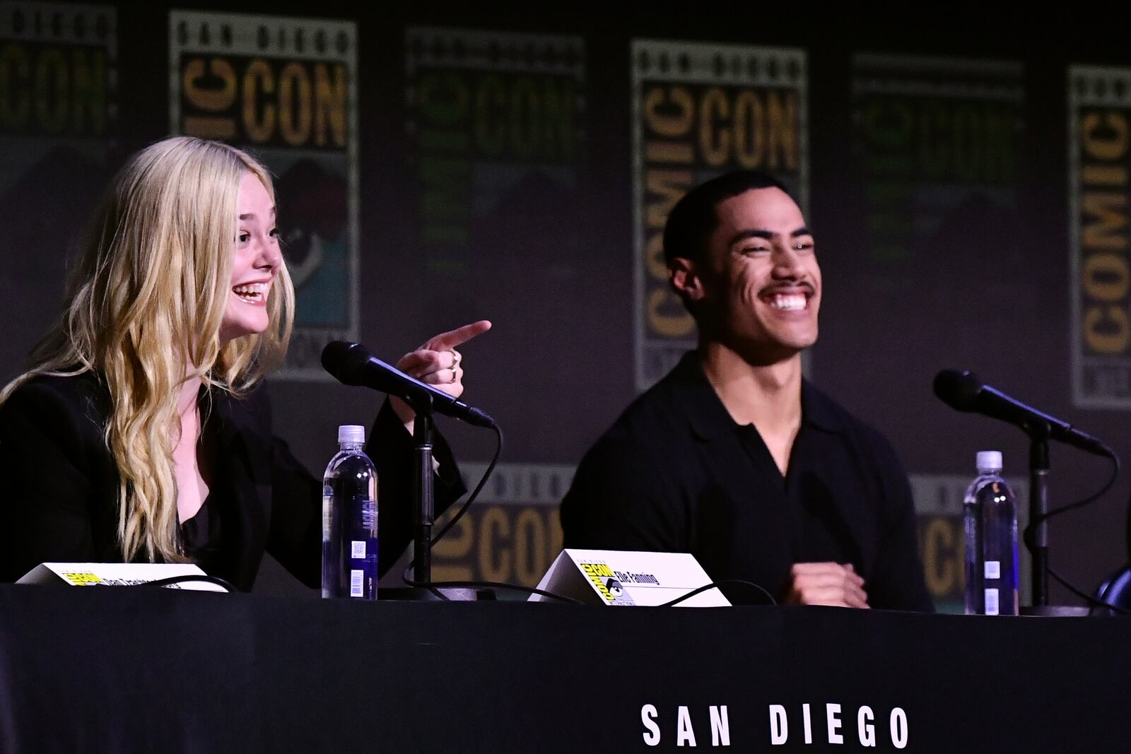 Elle Fanning, left, and Dimitrius Schuster-Koloamatangi attend a panel for "Predator: Badlands" during Comic-Con International on Friday, July 25, 2025, in San Diego. (Photo by Richard Shotwell/Invision/AP)