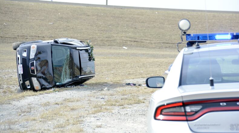 A Springboro woman was transported to West Chester Hospital after her Saturn VUE rolled over on the on-ramp from Interstate 75 to Ohio 129. MICHAEL D. PITMAN/STAFF