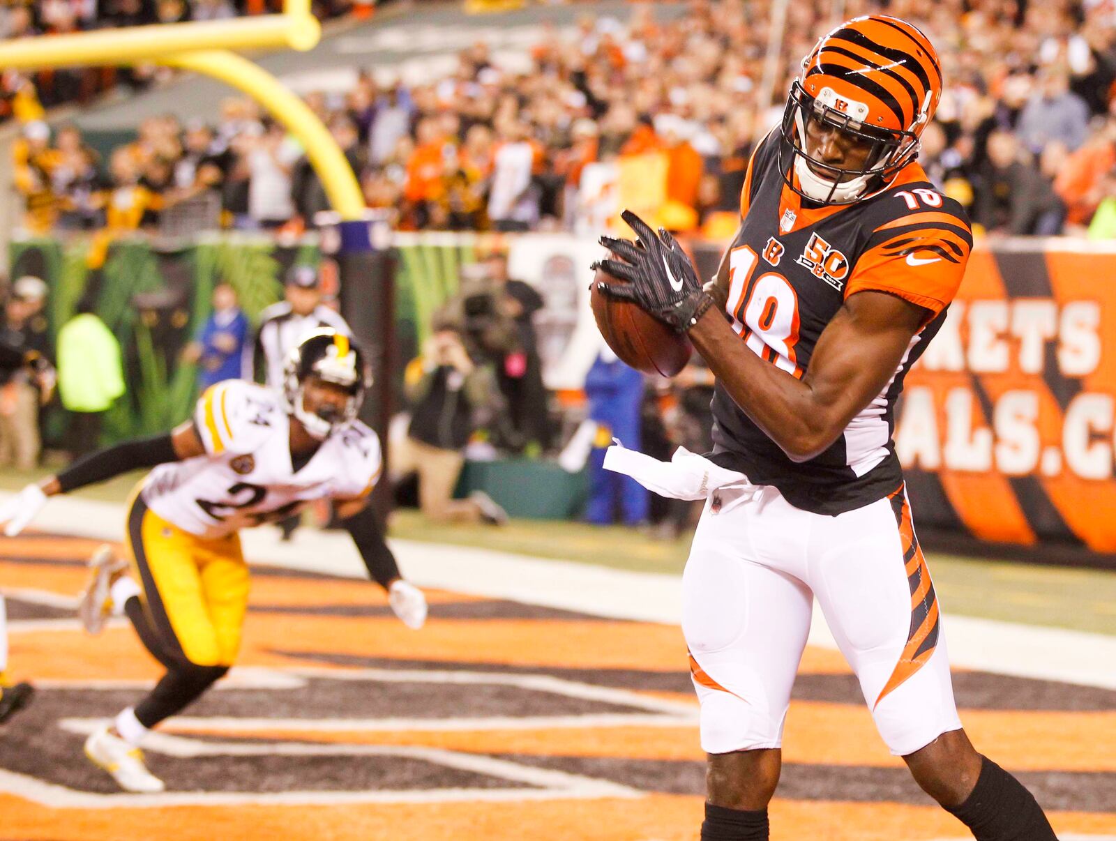 Bengals wide receiver A.J. Green (18) catches a touchdown pass during the first quarter of their game against the Steelers, at Paul Brown Stadium, Monday, Dec. 4, 2017. GREG LYNCH / STAFF