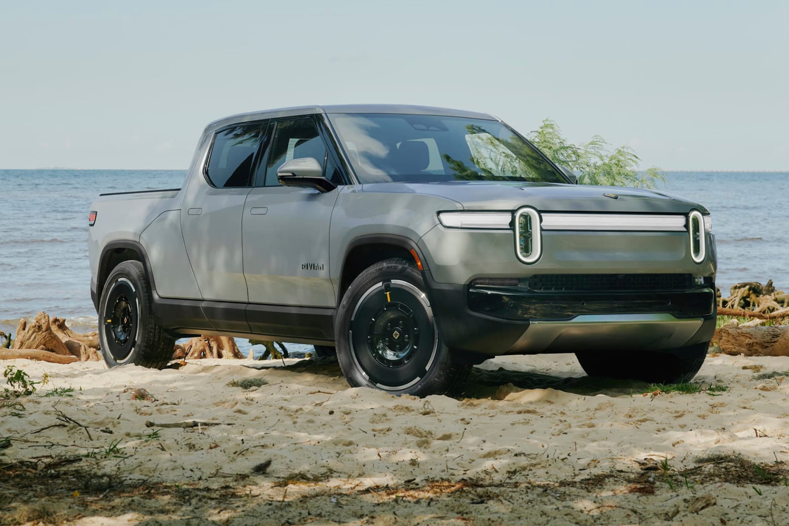 This photo provided by Rivian shows the R1T pickup truck, an electric truck that has multiple off-road modes and impressive towing capability. (Courtesy of Rivian via AP)
