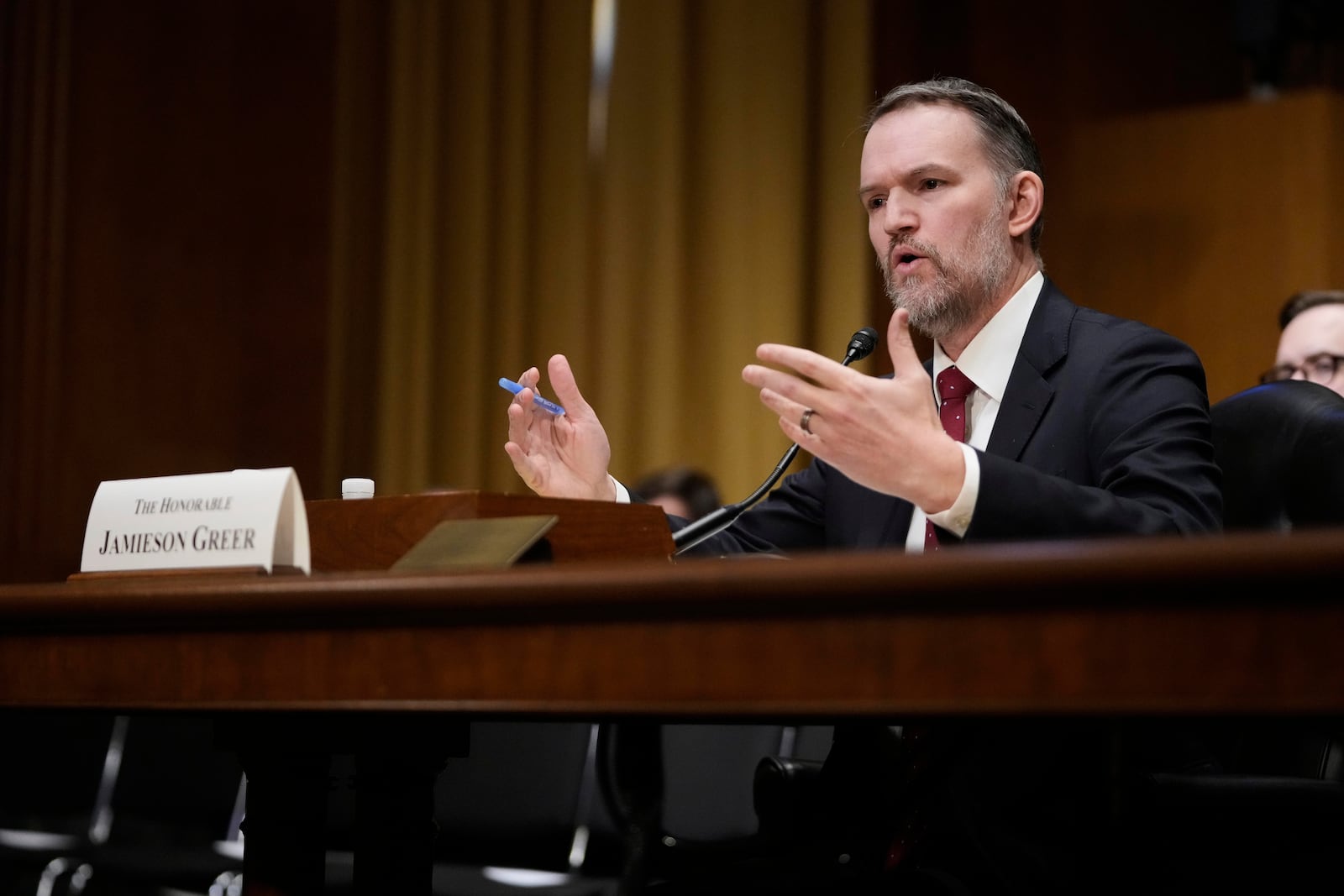 U.S. Trade Representative Jamieson Greer testifies before the Senate Finance Committee on Capitol Hill in Washington, Tuesday, April 8, 2025. (AP Photo/Mark Schiefelbein)