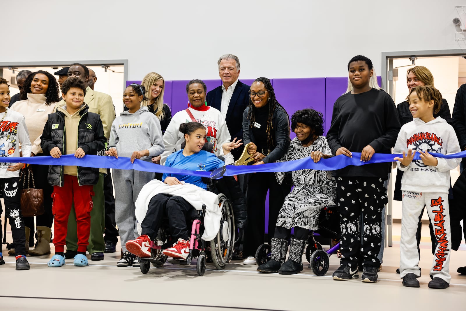 A crowd of supporters gathered for a ribbon cutting and tour of the completed expansion of the Robert "Sonny" Hill Jr. Community Center Wednesday, Dec. 17, 2025 in Middletown. NICK GRAHAM/STAFF