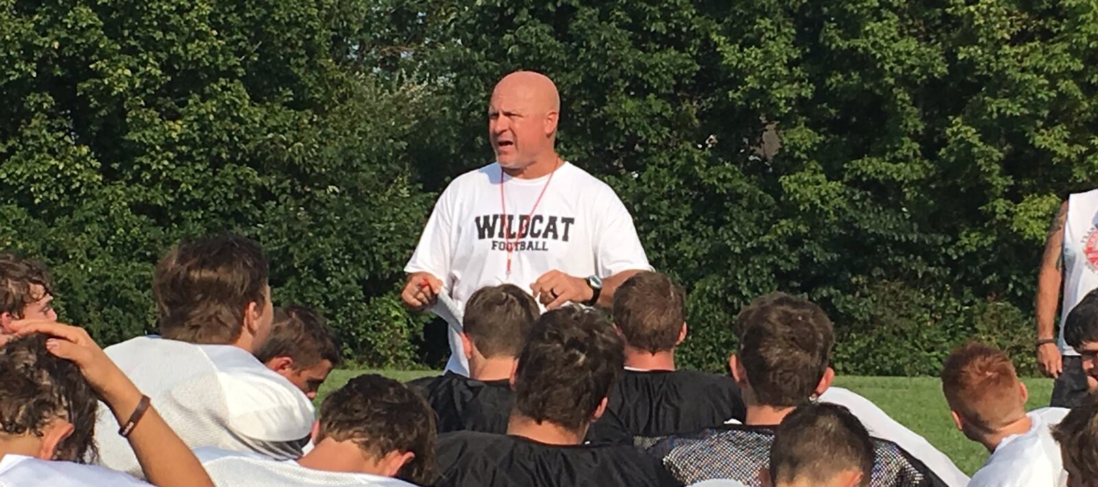 Franklin coach Brad Childers speaks to his team after a recent practice at the school. RICK CASSANO/STAFF