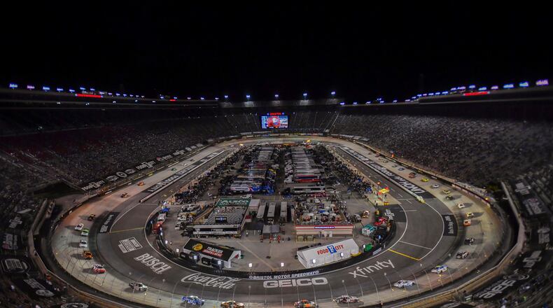 Drivers make their way around Bristol Motor Speedway during a caution period in the NASCAR Xfinity Series auto race Friday, Sept. 15, 2023, in Bristol, Tenn. (Emily Ball/Bristol Herald via AP)