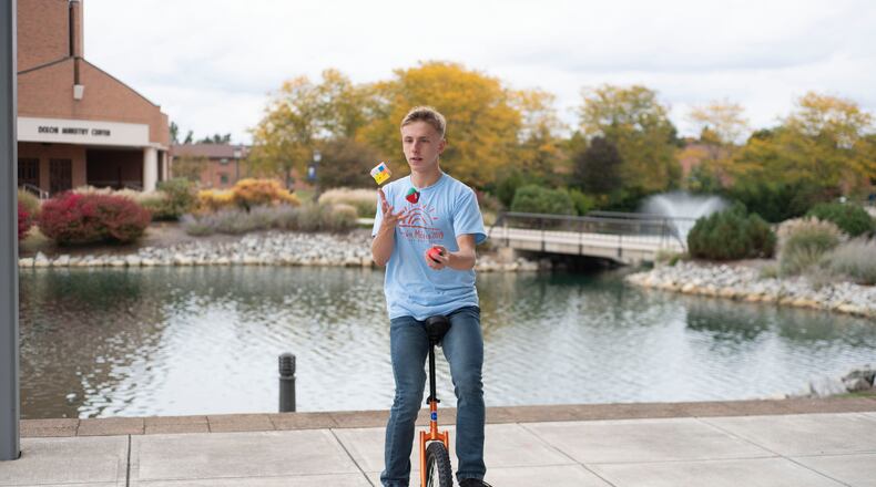 Thaddeus Krueger became the first person in the world to solve a Rubik’s Cube while juggling and riding a unicycle in 2019.
