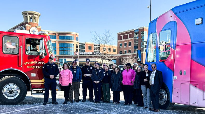 Members of the Middletown Division of Fire and officials from Atrium Medical Center gathered recently for a check presentation. SUBMITTED PHOTO