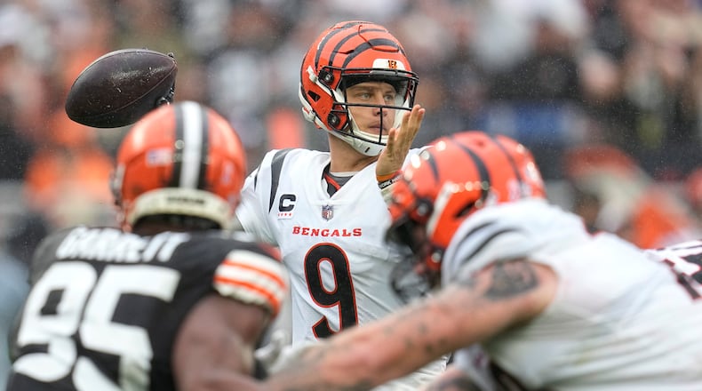 Cincinnati Bengals quarterback Joe Burrow (9) throws against the Cleveland Browns during the second half of an NFL football game Sunday, Sept. 10, 2023, in Cleveland. (AP Photo/Sue Ogrocki)