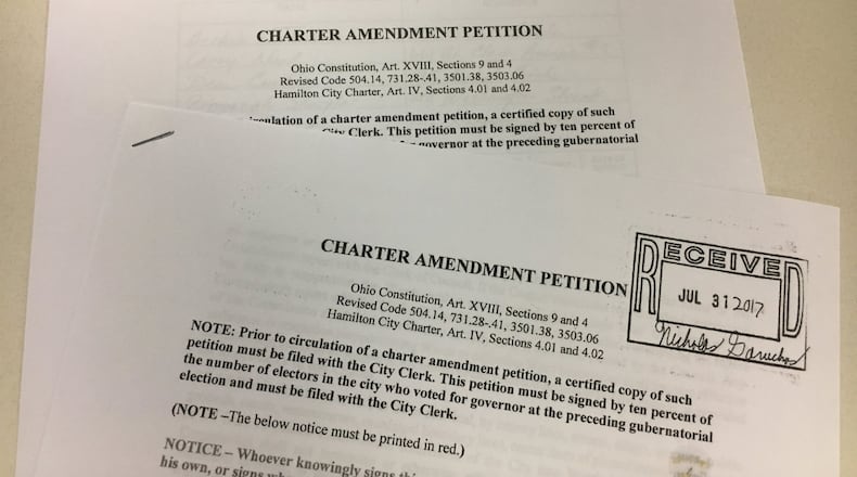 Supporters of Hamilton charter amendments to place term limits on the city council and mayor, and also create a ward system, failed to gather enough signatures for the November ballot. MIKE RUTLEDGE/STAFF