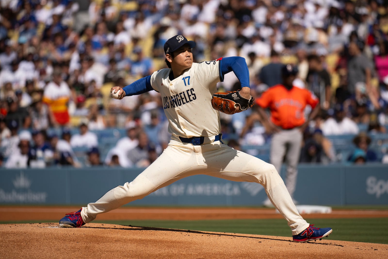 Los Angeles Dodgers starting pitcher Shohei Ohtani delivers during the first inning of a baseball game against the Houston Astros in Los Angeles, Saturday, July 5, 2025. (AP Photo/Kyusung Gong)