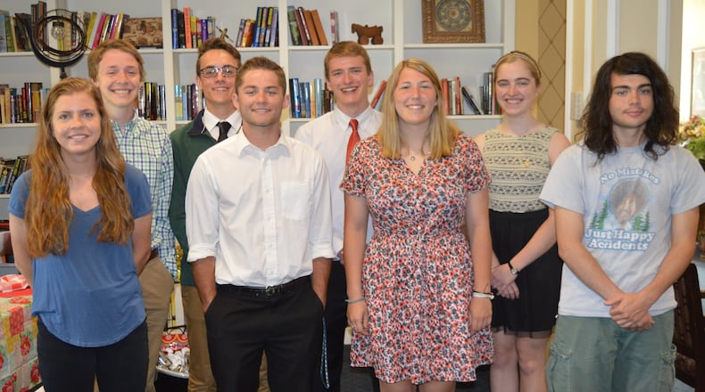 Eight graduating Talawanda High School seniors received $1,000 scholarships from the Oxford Rotary Club s Hefner Fund this year. Honored at a club lunch May 17, they are front row, from left, Beth Hansford, Cody Kiefer, Natalie Cobb and Elijah Frazier. Back row, Alex Bowie, Peter Whiteman, Adam Mandrell and Emily Froude. CONTRIBUTED/BOB RATTERMAN