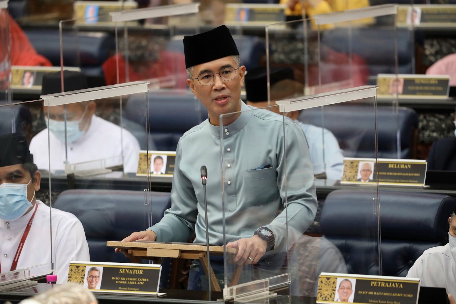 FILE - Malaysia's Finance Minister Zafrul Aziz delivers the 2021 budget speech at parliament in Kuala Lumpur, Malaysia, Nov. 6, 2020. (AP Photo/Vincent Thian, File)