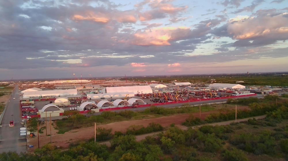 FILE - This aerial photo shows an entrance to the Stargate artificial intelligence data center complex in Abilene, Texas on Sept. 22, 2025. (AP Photo/Matt O'Brien, File)