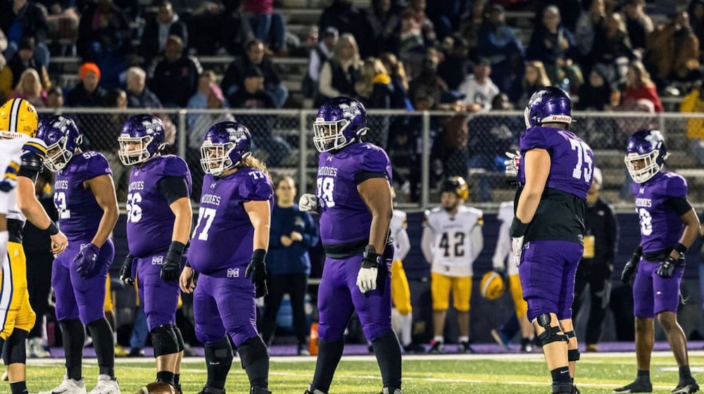The Middletown High School offensive line has played a big part in the football team's run to the Division I regional final. CARA DAUGHERTY / CONTRIBUTED