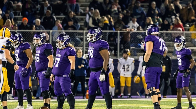 The Middletown High School offensive line has played a big part in the football team's run to the Division I regional final. CARA DAUGHERTY / CONTRIBUTED