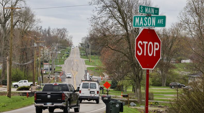 David Schmitt, who lives in the 500 block of South Main Street in Monroe, urged City Council to erect a guardrail to keep drivers from crashing into his and his neighbors' properties. He said no one drives the speed limit and his mailbox has been hit 30 times in the last 10 years. NICK GRAHAM'STAFF
