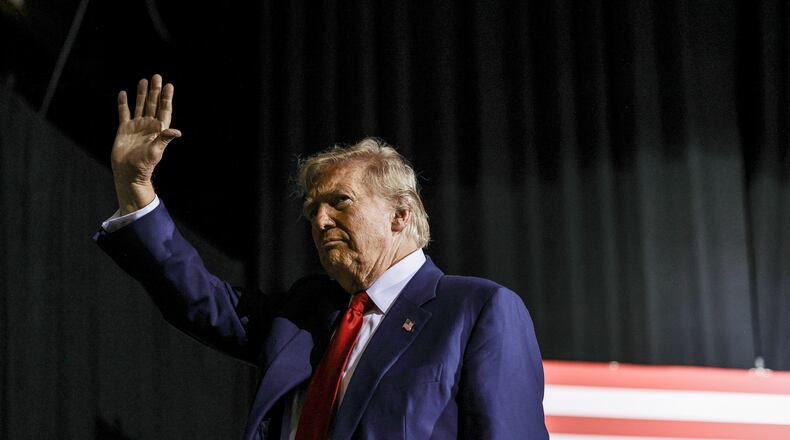 FILE — Former President Donald Trump, the Republican presidential nominee, waves during a campaign rally at the Tucson Music Hall in Tucson, Ariz., on Thursday, Sept. 12, 2024. The former president left many key details about the overtime plan unaddressed, including whether the exception would apply to the payroll taxes that fund Social Security and Medicare. (Adriana Zehbrauskas/The New York Times)