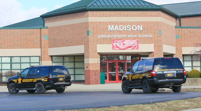 Some parents and residents in the Madison school system in Butler County have sued the district over the school boards policy plan to arm school staffers. The district was the site of a 2016 student shooting that wounded three students. STAFF FILE/2016