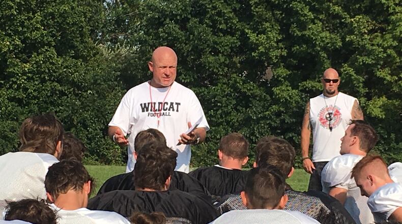 Franklin coach Brad Childers speaks to his team after a recent practice at the school. RICK CASSANO/STAFF