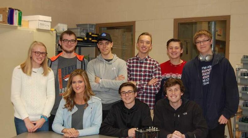 Some of Fairfield High School s Samsung contest team (sitting left to right): Katarina Putnick, leader of project administration team; Alex Quedens, leader of software team; Jack Biondo, leader of hardware team; and standing from left to right are Megan Barth, Bryce Behr, Ryan Brown, Jared Cusick, Jackson Cowan, Michael Ryan. The team won top honors in Ohio for their science project and were just named among the top 10 national finalists - winning $50,000 in technology for the school - and are now competing for a $100,000 in equipment.