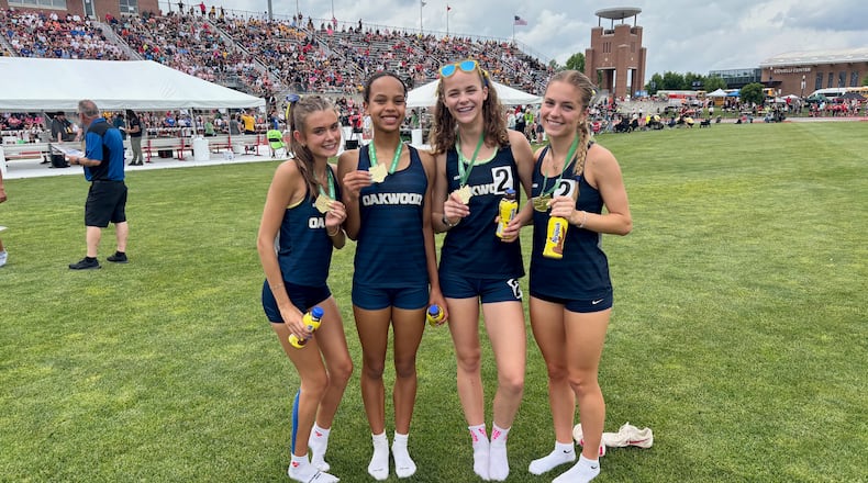 Oakwood's Kaya Asinjo races to victory in the final leg of the 4x800 relay at the Division II state track and field championships on Friday, June 6, 2025, at Jesse Owens Memorial Stadium in Columbus. DAVID JABLONSKI / STAFF
