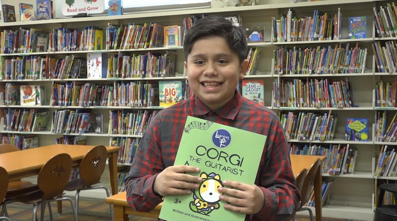 Crawford Woods Elementary student Harim Ruiz can now walk into his Hamilton school library full of books while carrying a copy of his own work. Available now on Amazon, the 9-year-old’s book – entitled “Corgi The Guitarist”- also features Ruiz’s illustrations. (Provided Photo\Journal-News)