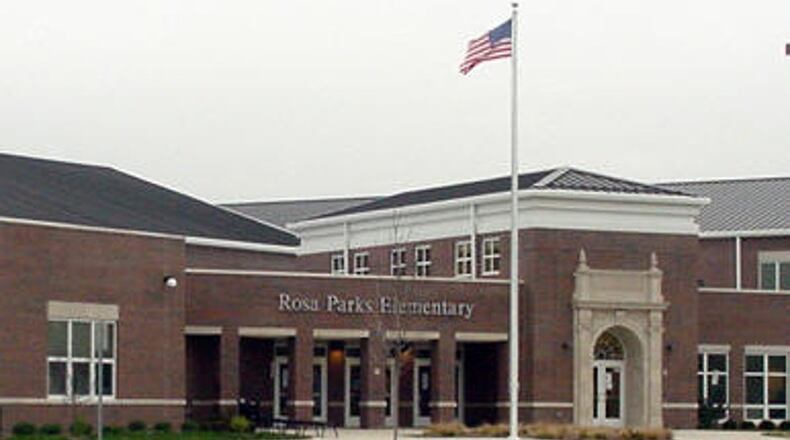 A third-grader at Rosa Parks Elementary came to school Monday with a loaded 9 millimeter gun and four extra bullets in his pocket, according to Middletown police. STAFF FILE PHOTO