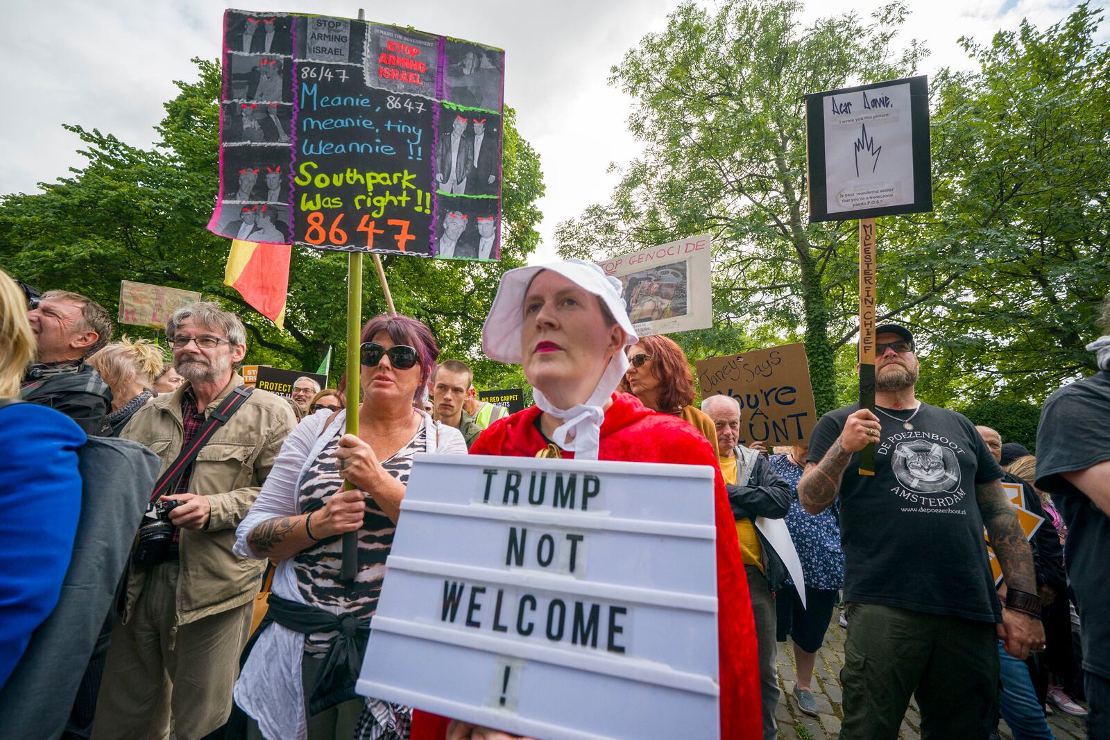 People take part in a Stop Trump Scotland protest outside the US Consulate in Edinburgh, as President Donald Trump begins his five-day private trip to the country at his Turnberry golf course in South Ayrshire on Saturday July 26, 2025. (Jane Barlow /PA via AP)