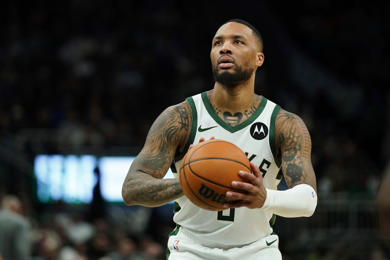 FILE - Milwaukee Bucks' Damian Lillard shoots a free throw during the second half of an NBA basketball game against the Orlando Magic, March 8, 2025, in Milwaukee. (AP Photo/Aaron Gash, File)