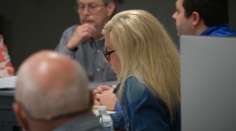 College Corner Fiscal Officer Jennifer Woods' current contract shows she makes more than $72,000 a year. Her benefits include 30 vacation days, two personal days and 120 sick days. WCPO/CONTRIBUTED