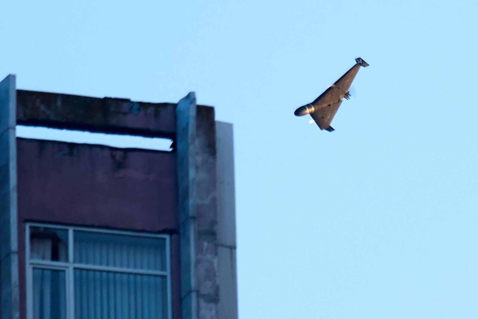 FILE - A Russian drone attacks a building during Russia's massive missile and drone air attack in Kyiv, Ukraine, June 17, 2025. (AP Photo/Efrem Lukatsky, file)