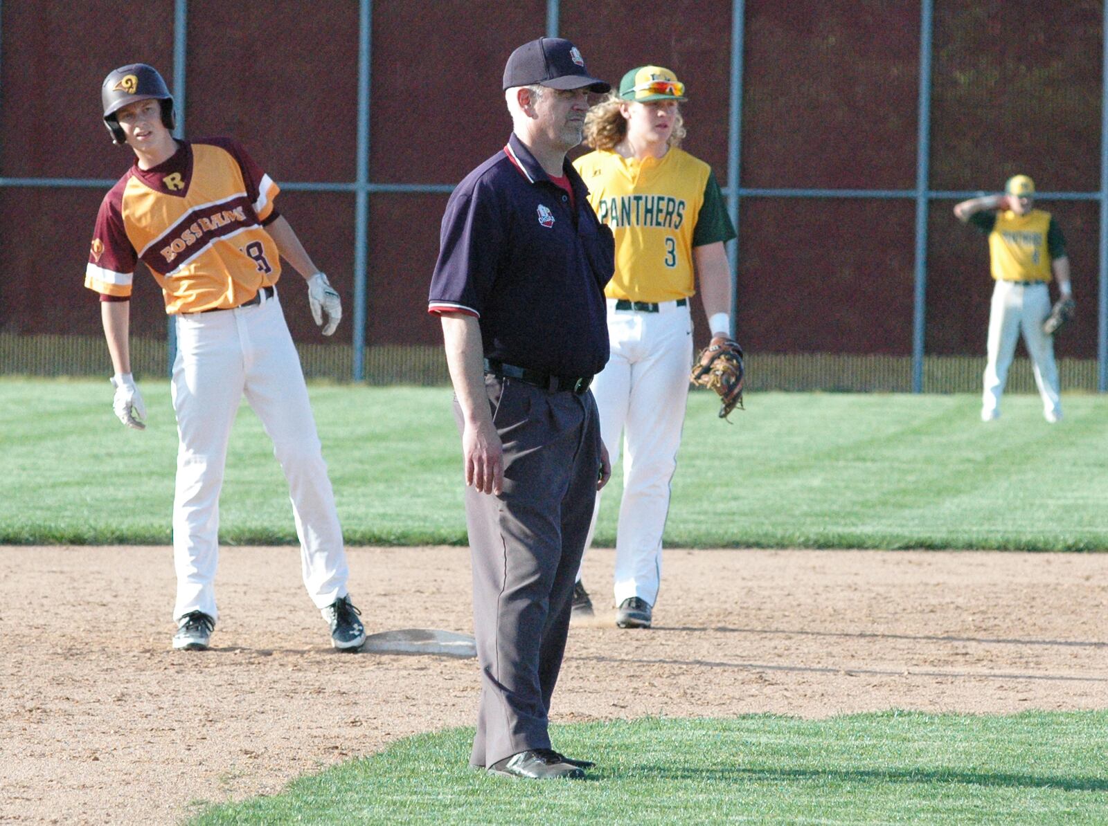 Joe Schottelkotte (18) of Ross looks toward the RHS dugout Monday during a Southwest Ohio Conference baseball game against Little Miami in Ross Township. Ross won 2-1. RICK CASSANO/STAFF