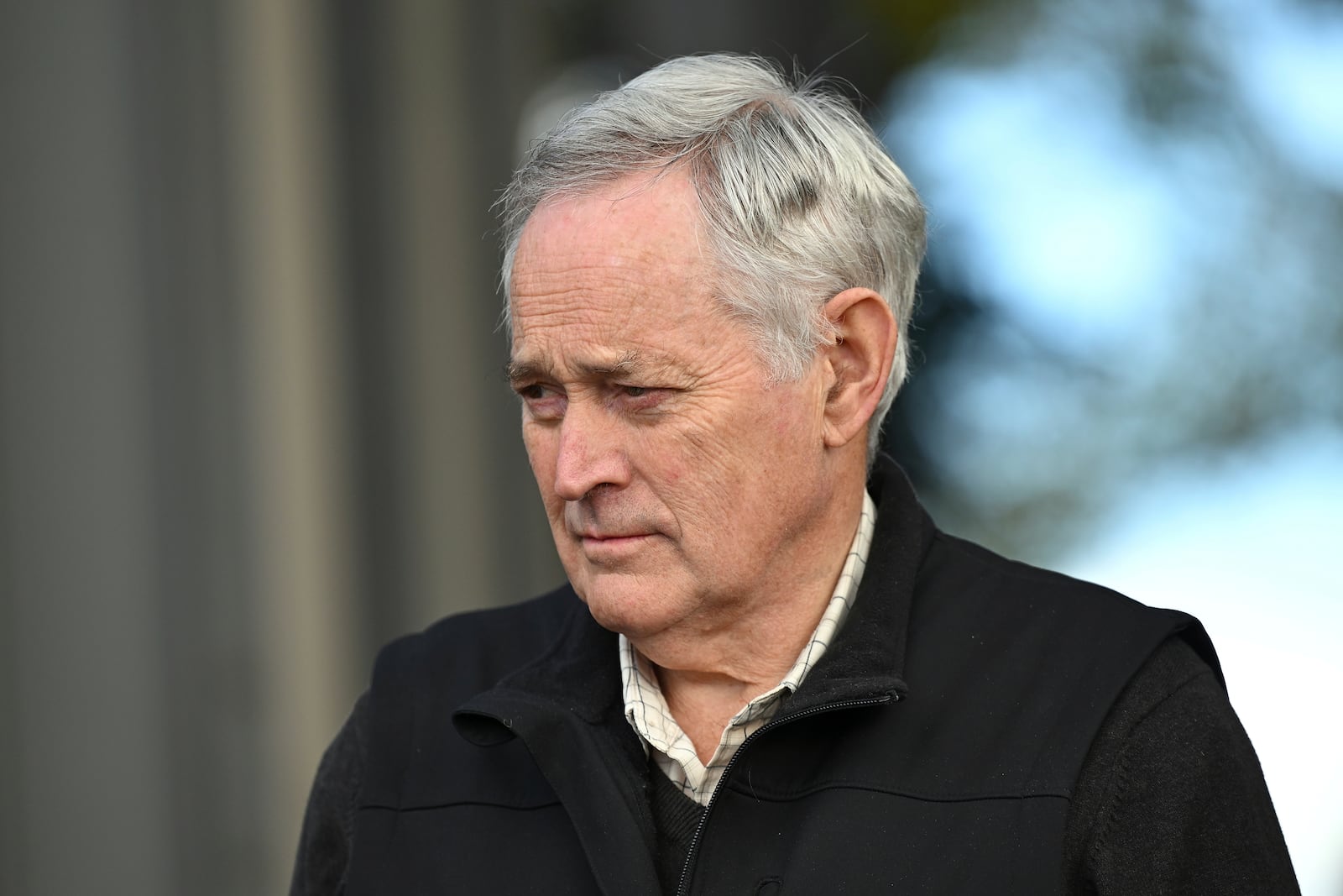 Ian Wilkinson, a poison survivor, leaves court during a lunch break during the murder trial of Erin Patteson in Morwell, Australia, on June 4, 2025. (James Ross/AAP Image via AP)