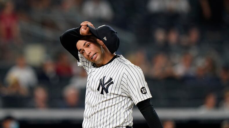 New York Yankees relief pitcher Luis Cessa (85) reacts coming off the mound after allowing a go-ahead, two-run single to Boston Red Sox's Xander Bogaerts in the 10th inning of a baseball game, Sunday, June 6, 2021, at Yankee Stadium in New York. The Red Sox defeated the Yankees 6-5 in 10 innings. (AP Photo/Kathy Willens)
