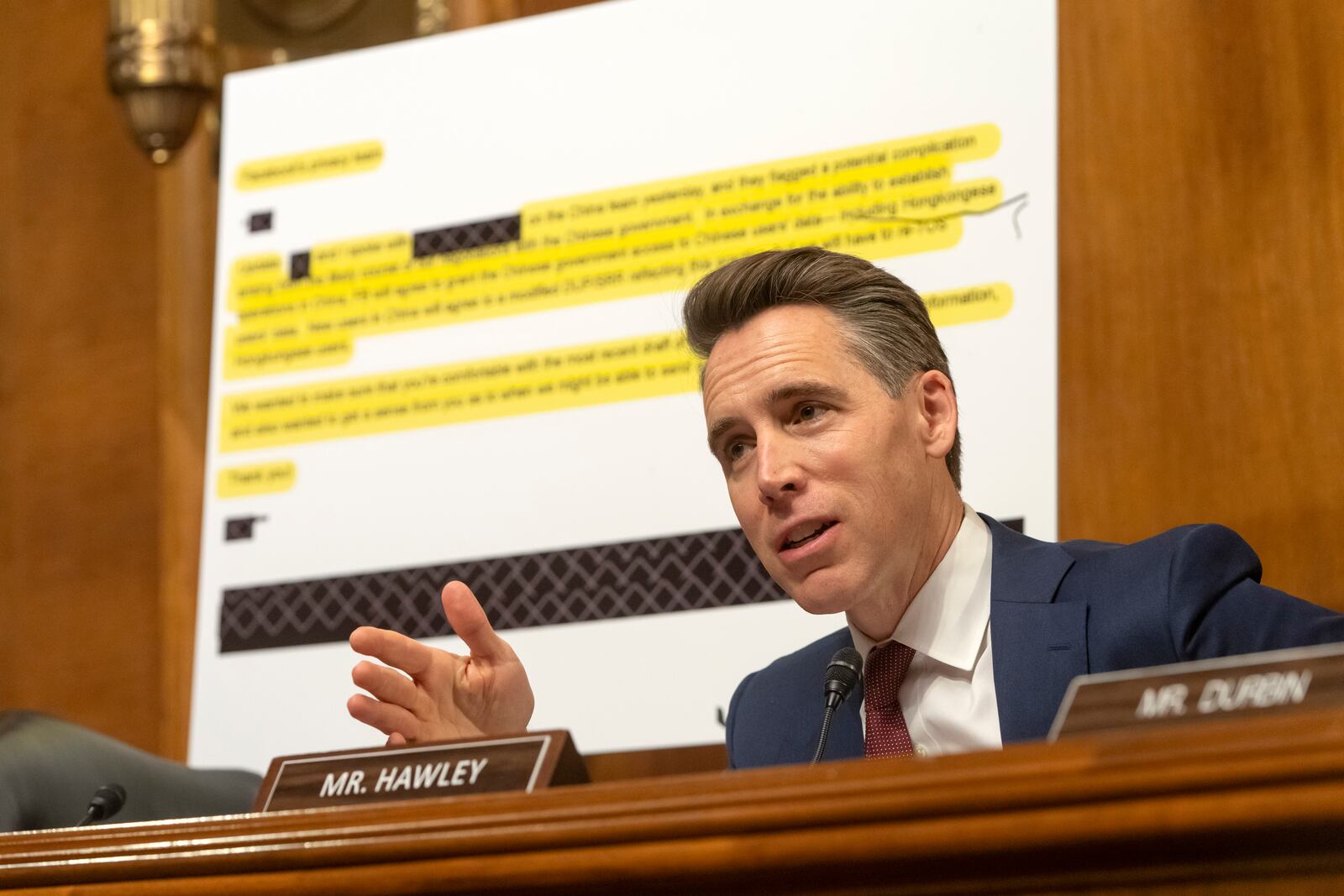 Sen. Josh Hawley, R-Mo., speaks in front of a chart showing what he described as Facebook internal documents during a hearing of the Senate Judiciary Subcommittee on Crime and Counterterrorism on Capitol Hill, Wednesday, April 9, 2025, in Washington. (AP Photo/Mark Schiefelbein)