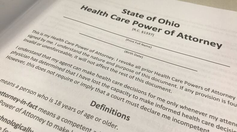 Ohioans are all urged to have advanced care directives filled out, such as the pictured Health Care Power of Attorney form. KAITLIN SCHROEDER/STAFF