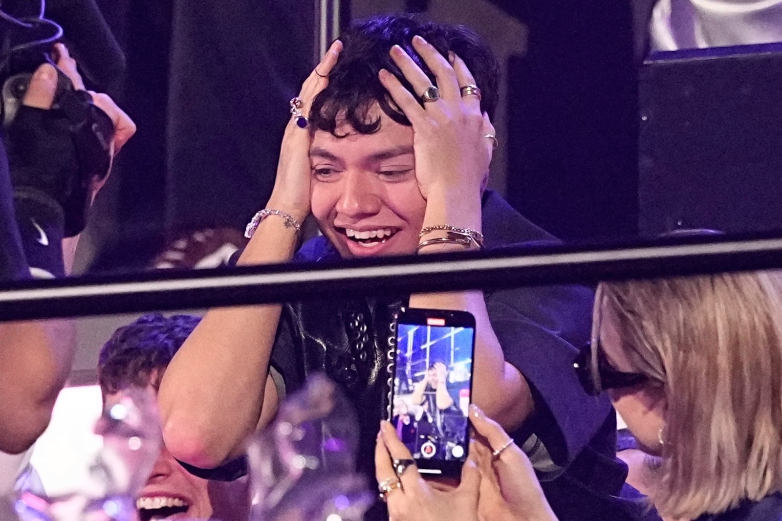 JJ from Austria who performed the song "Wasted Love" reacts to voting during the Grand Final of the 69th Eurovision Song Contest, in Basel, Switzerland, Saturday, May 17, 2025. (AP Photo/Martin Meissner)