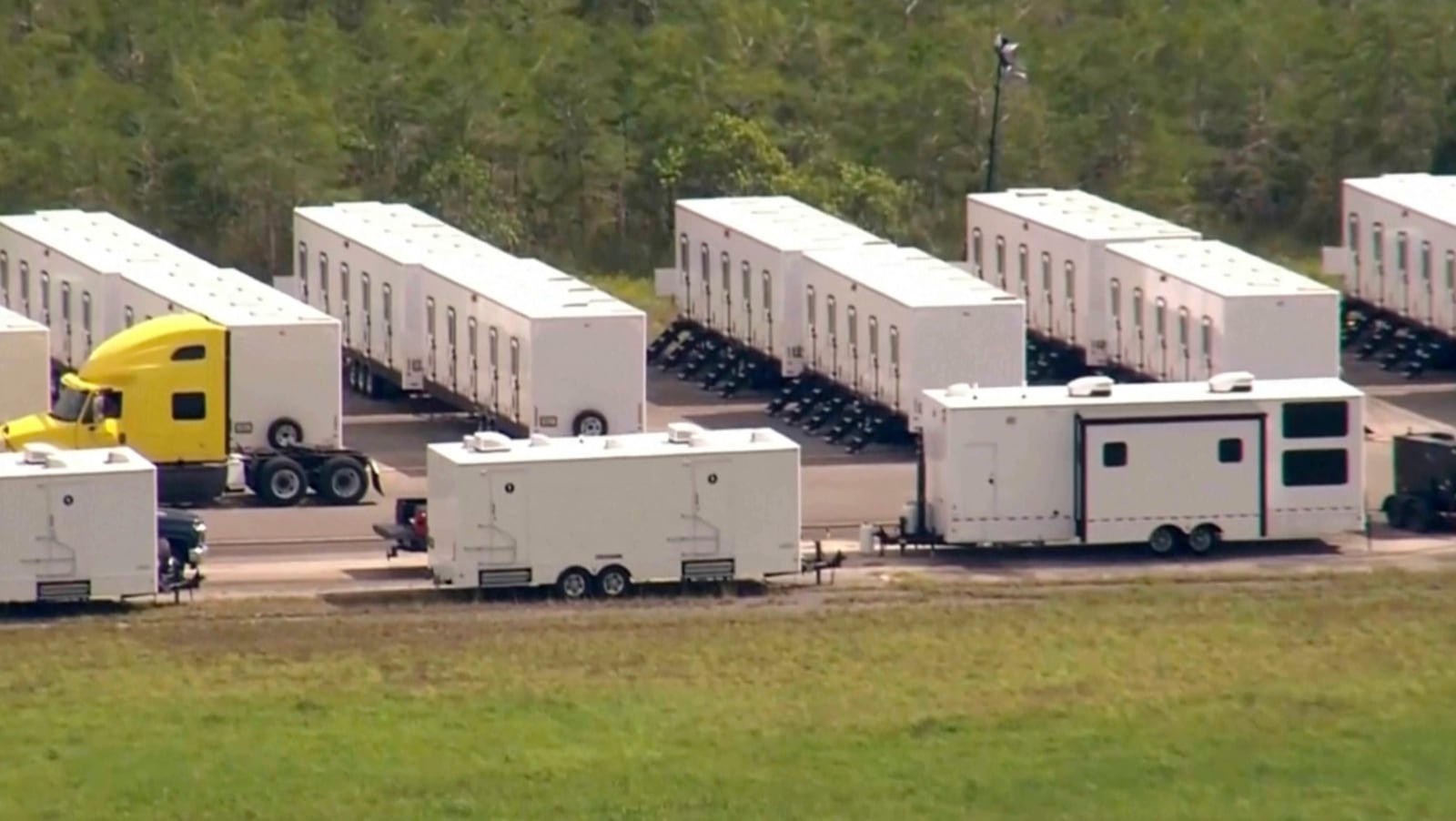 This image grab from video shows activity at an immigration detention facility dubbed “Alligator Alcatraz” located at an isolated Everglades airfield. (WSVN via AP)