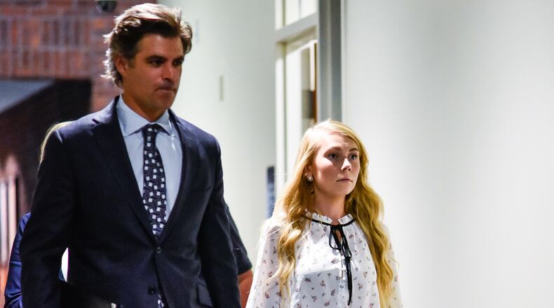 Brooke Skylar Richardson, right, charged with murder for the death of her baby then burying her in the back yard of her Carlisle home, walks with defense attorney Charles M. Rittgers before appearing for a pre-trial hearing in Warren County Common Pleas Court Monday, July 1 in Lebanon. NICK GRAHAM/STAFF