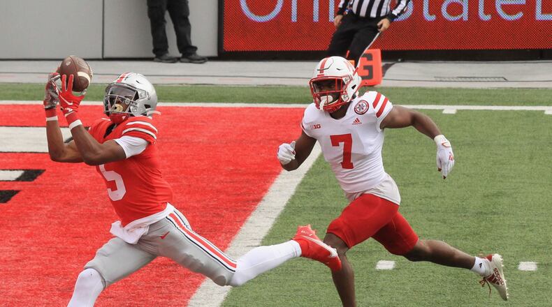 Ohio State's Garrett Wilson catches a touchchdown in the first quarter against Nebraska on Saturday, Oct. 24, 2020, at Ohio Stadium in Columbus. David Jablonski/Staff