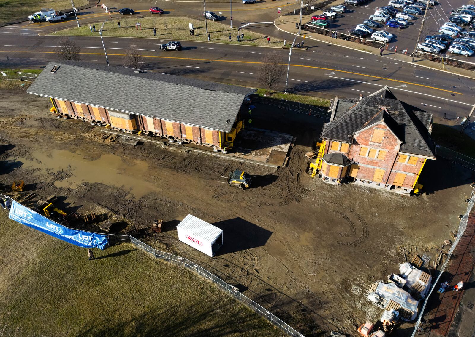 The second of two buildings that was once a train depot owned by CSX was moved by Wolfe House And Building Movers to its new location at the corner of Maple Avenue and MLK Jr. Boulevard Tuesday, Jan. 17, 2023 in Hamilton. The first building, a 220-ton two-story building, was moved in December. NICK GRAHAM/STAFF