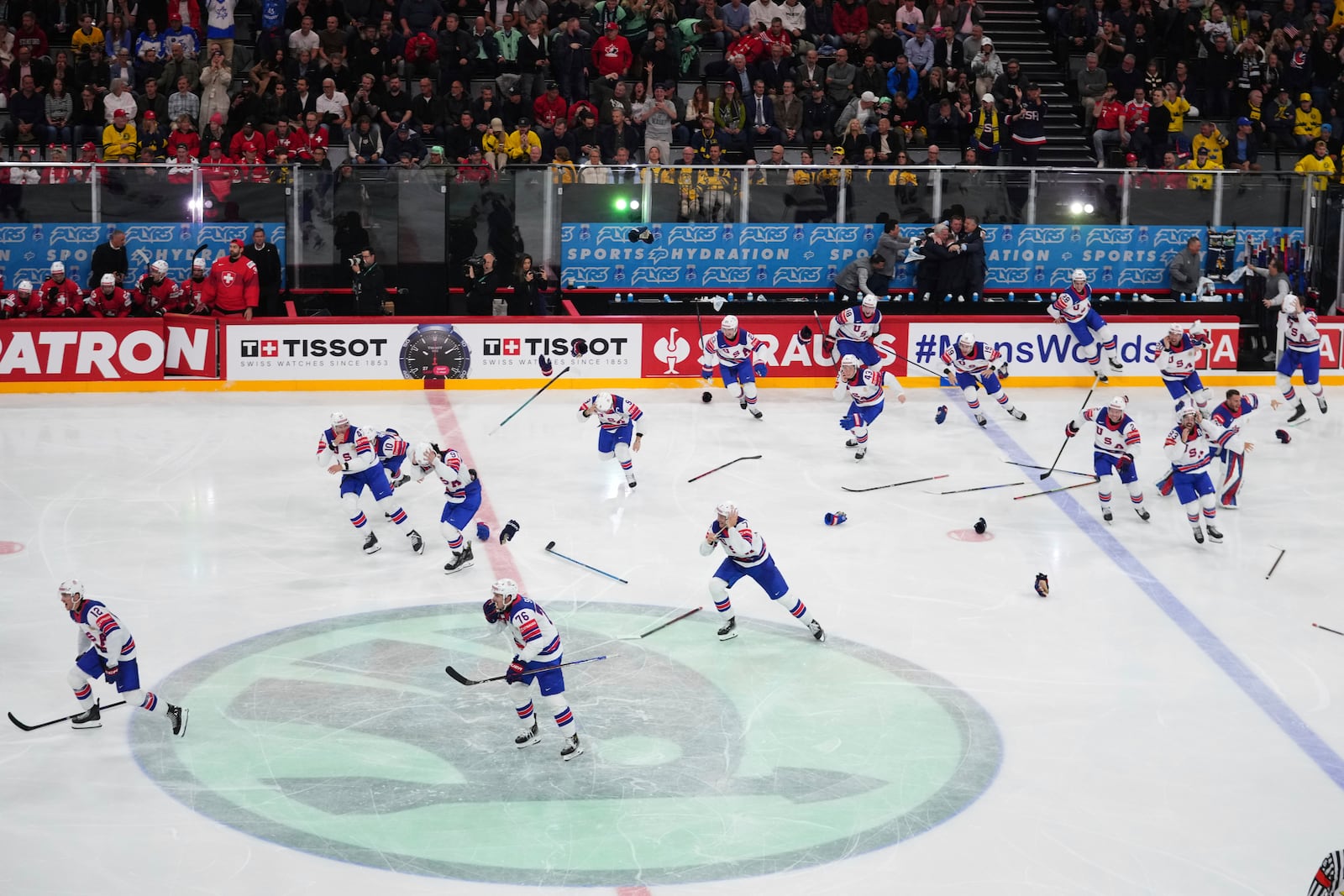 Team USA celebrates after winning the final match between United States and Switzerland at the ice hockey world championships in Stockholm, Sweden, Sunday, May 25, 2025. (AP Photo/Petr David Josek)