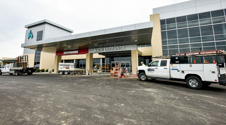 Construction continues at Kettering Health Network Middletown, a 67,000-square-foot medical center set to open Aug. 8 on Ohio 122, just east of Interstate 75. The center features a full-service emergency department, outpatient lab and imaging services, including a full complement of magnetic resonance imaging (MRI), computed tomography (CT), X-ray and ultrasound.The new structure also features a medical office building for physician practices and shell space for future expansion. NICK GRAHAM/STAFF
